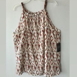 VINCE CAMUTO cream patterned blouse.